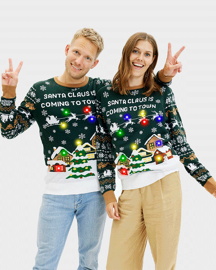 Le Père Noël arrive en ville ! Pull vert LED pour homme