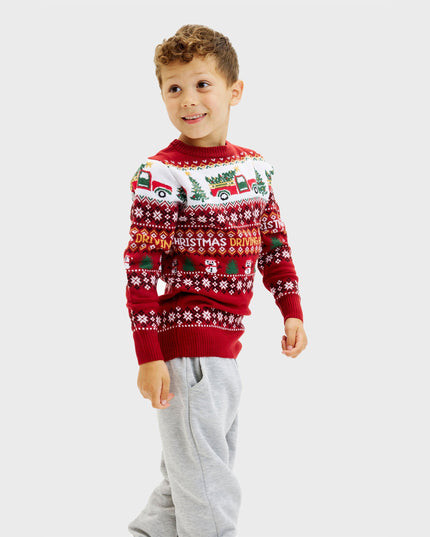 Rentrer à la maison pour acheter un pull de Noël pour enfants