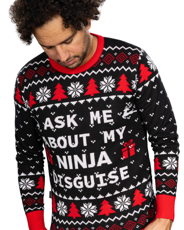 Demandez-moi des infos sur mon pull de Noël déguisé en ninja