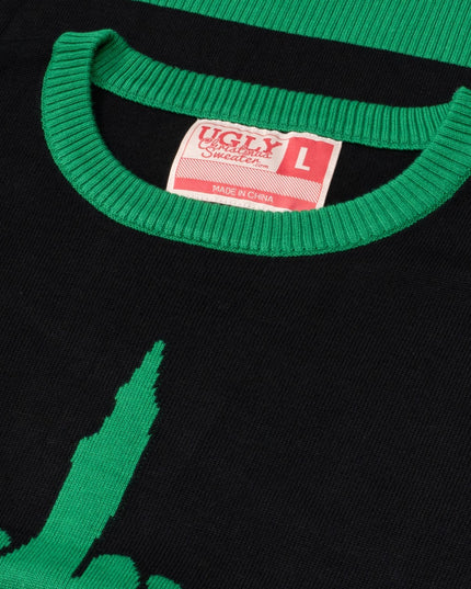 Pull moche unisexe avec monstre de dessin animé vert faisant un doigt d'honneur