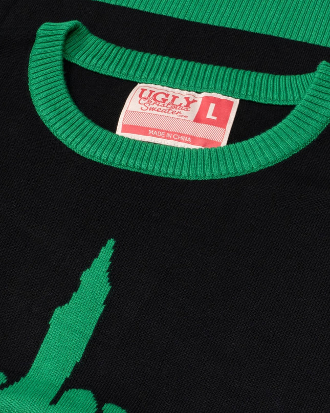 Pull moche unisexe avec monstre de dessin animé vert faisant un doigt d'honneur