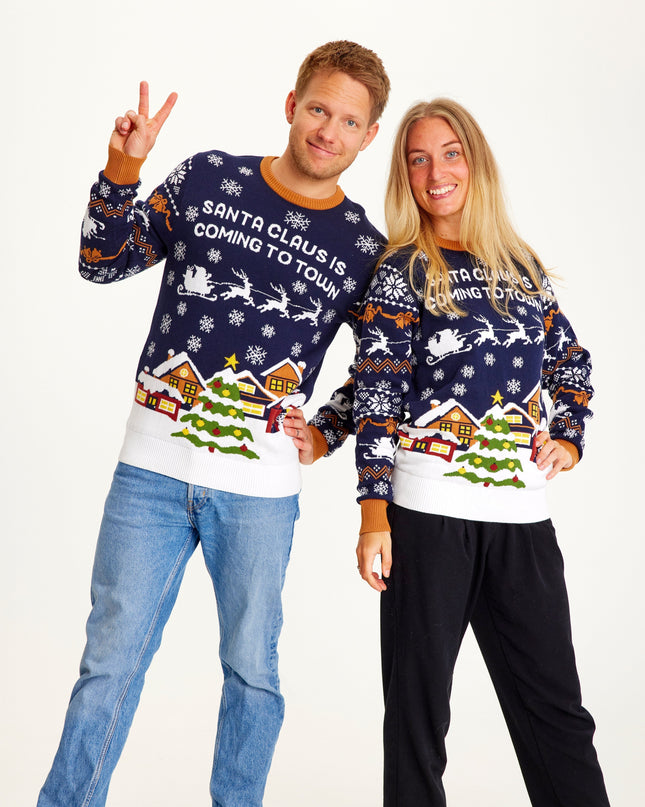 Pull bleu marine « Le Père Noël arrive en ville » - Femme