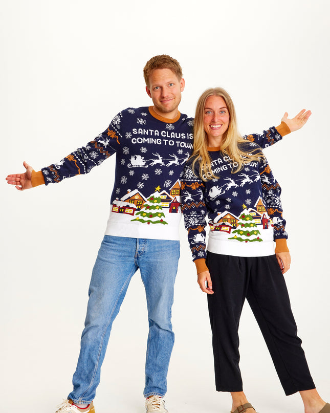 Pull bleu marine « Le Père Noël arrive en ville » - Femme