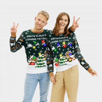 Le Père Noël arrive en ville ! Pull vert LED pour homme