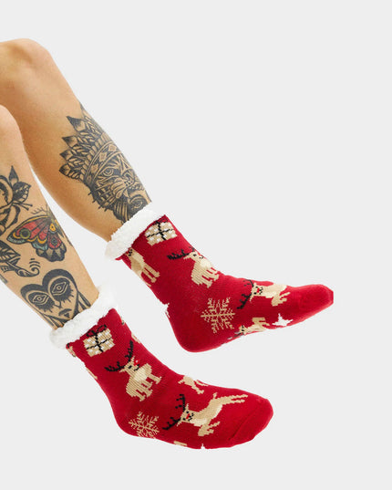 Chaussettes-chaussons de Noël avec motifs de rennes et de cadeaux