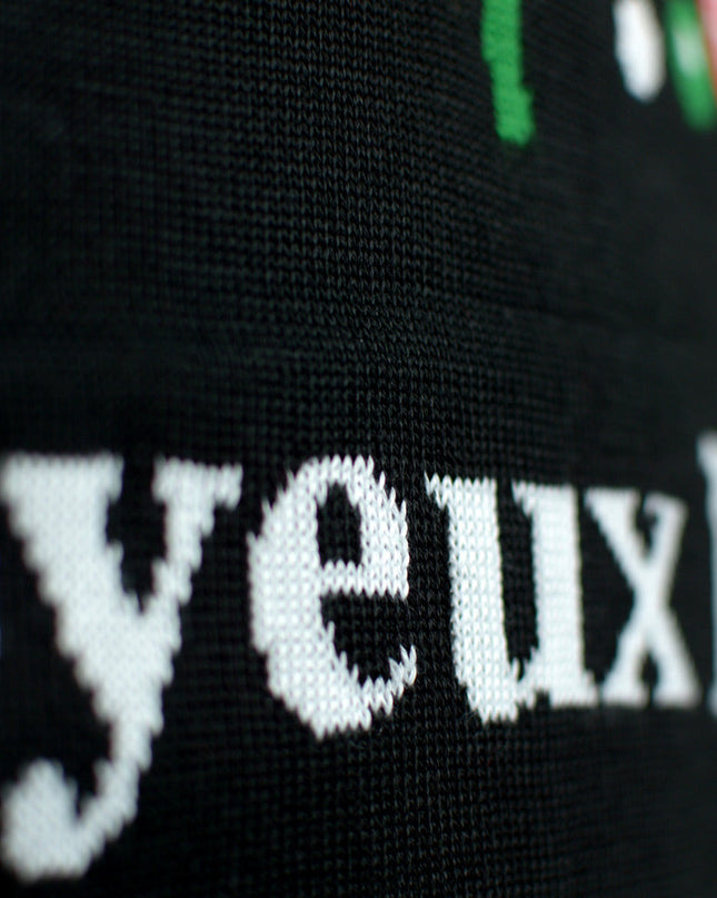 Pull de Noël noir pour toute la famille avec le motif « Joyeux Noël »