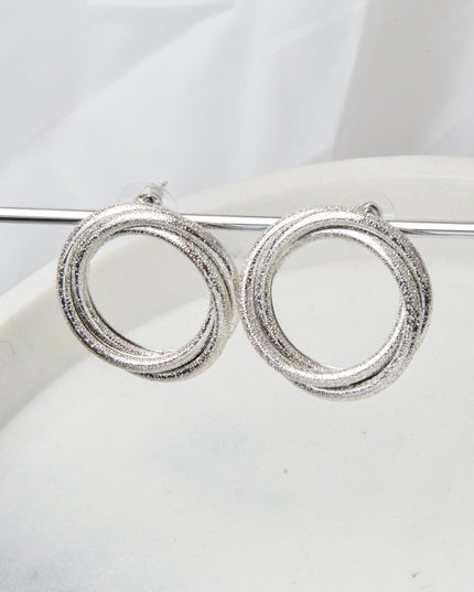 Boucles d'oreilles rondes - Argent torsadé et scintillant