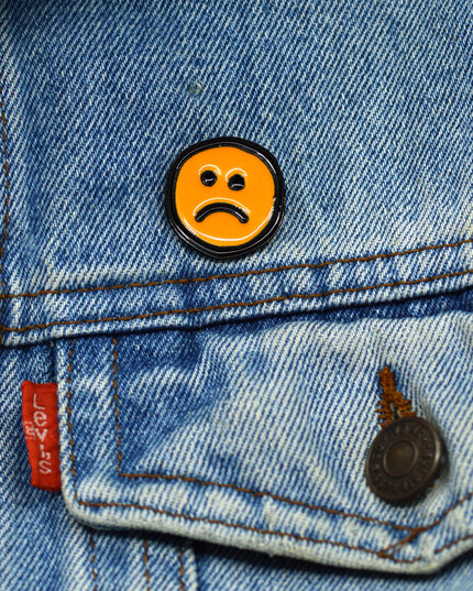 Épingler un smiley triste