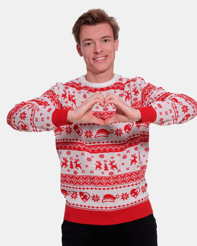 Pull de Noël à rayures rouges et blanches