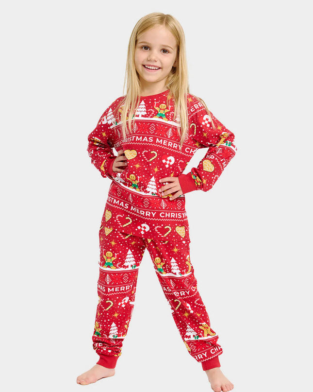 Pyjamas de Noël rouges pour toute la famille avec des biscuits de Noël